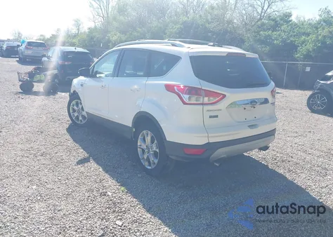 2014 Ford Escape Titanium z USA, uszkodzony, nr VIN 1FMCU9J9XEUD42876
